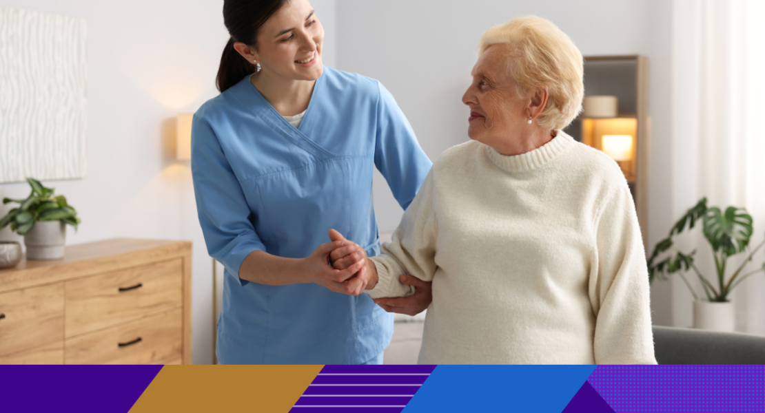 carer holding hands with older lady