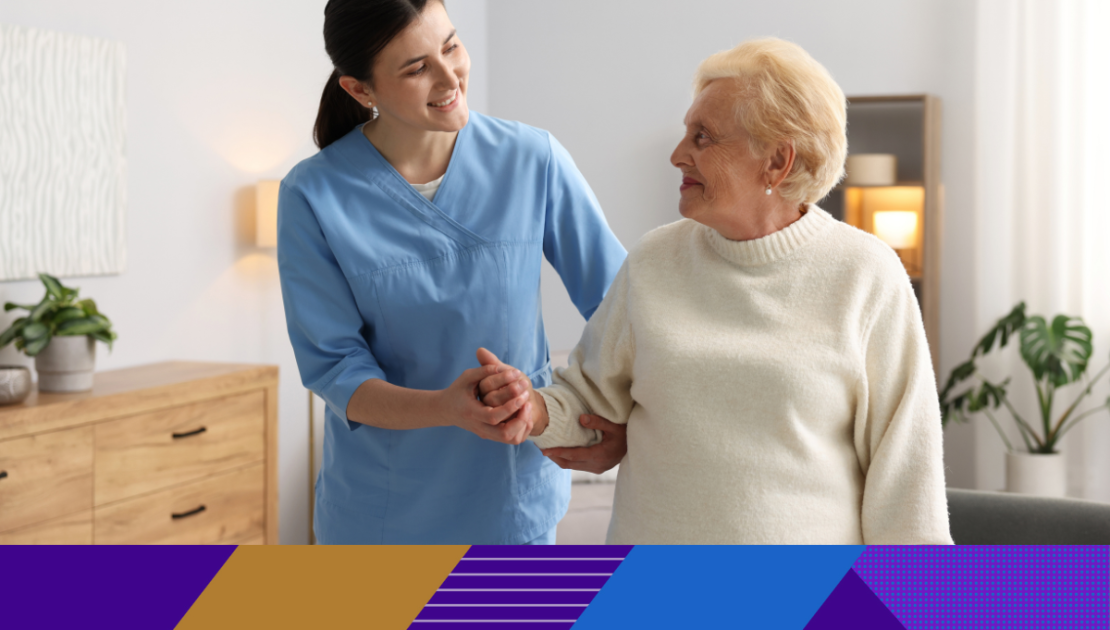 carer holding hands with older lady